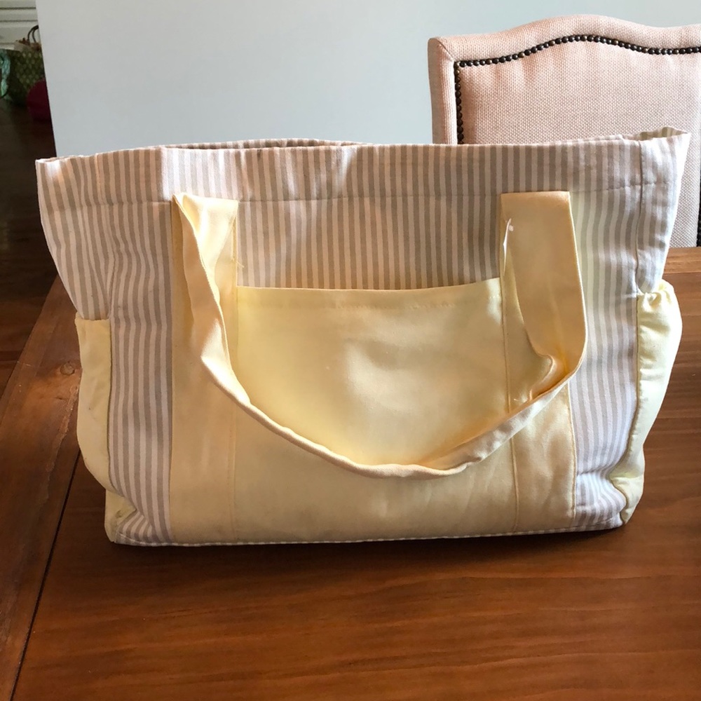Yellow, gray and white baby bag